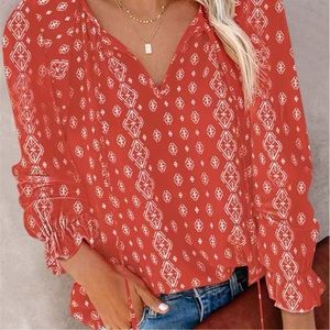 Adorable burnt Orange boutique blouse brand new